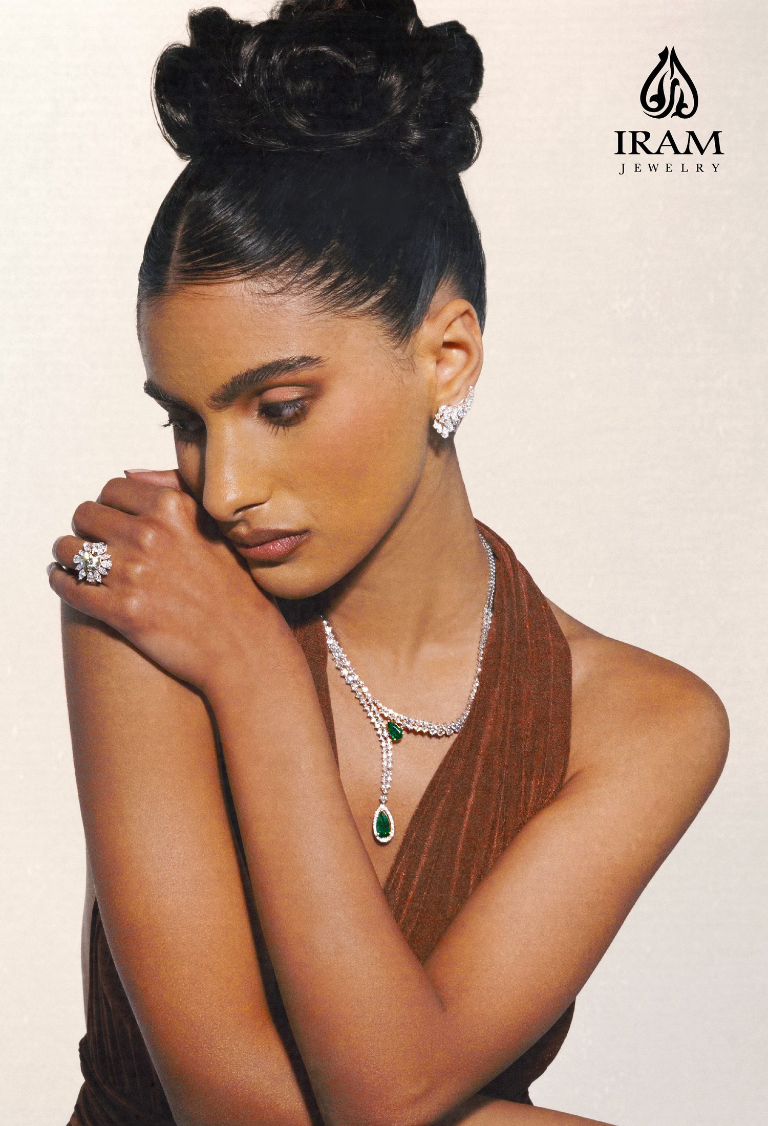 Woman wearing jewelry with IRAM Jewelry logo