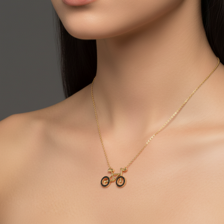 Gold necklace with a small pendant worn- siran by iram