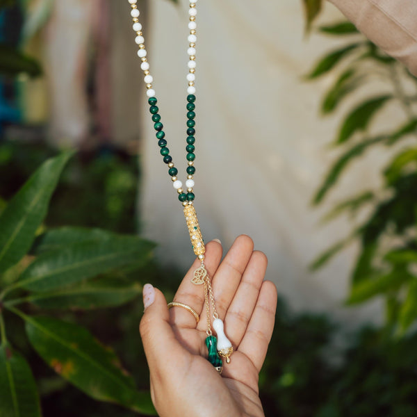 Natural ivory rosary in malachite