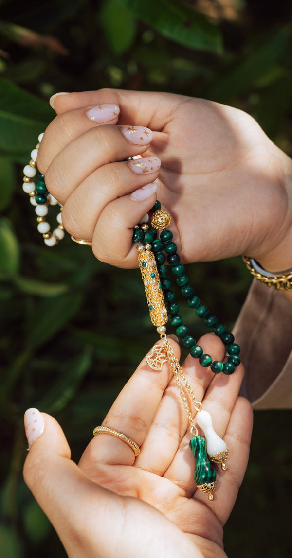 Natural ivory rosary in malachite